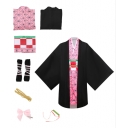 Halloween costume featuring Tanjiro Kamado, Nezuko Agatsuma, Zenitsu Agatsuma, and Giyu Tomioka from Demon Slayer.