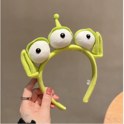 Three-eyed monster headband