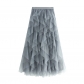 Autumn and winter loose waist and waist fashion versatile thin net yarn stitching irregular mid -length high waist skirt