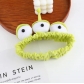 Three-eyed monster headband