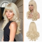 Blonde wig with bangs, wavy layered cut, natural and voluminous synthetic heat-resistant wig, everyday wear, 24 inches.