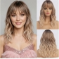 Long, wavy, gradient gold wig with bangs, mid-length gold synthetic fiber wavy edge wig for everyday wear.