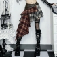 Dark-themed irregular plaid midi skirt, a new 2026 gothic street punk music festival outfit.